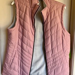 Reversible vest, nylon outer and warm fuzzy inner. Pink and Gray